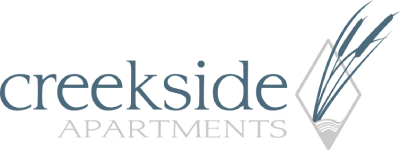 the logo for creepside apartments with a green background and the words creep side apartments